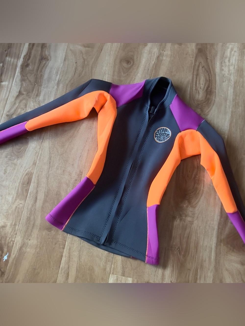 Women’s size S rip curl long sleeve jacket Rashguard - Black, Orange & Purple
